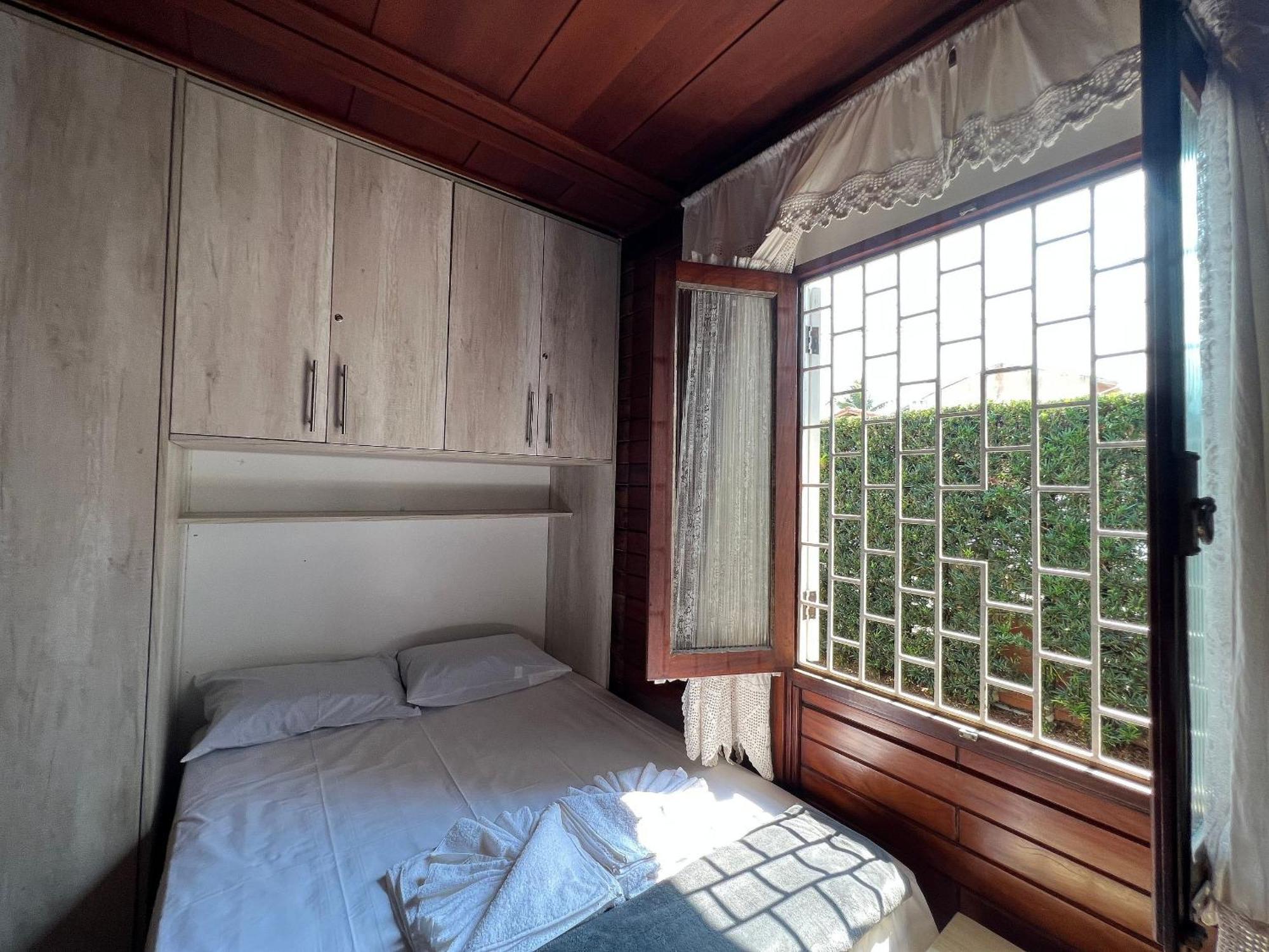 Casa agradável com piscina, a poucos passos da Praia Peruíbe Exterior foto